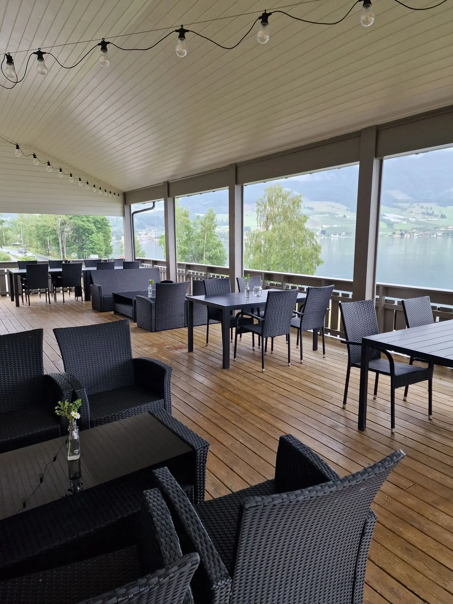 Restaurant lounge seating with panoramic fjord views