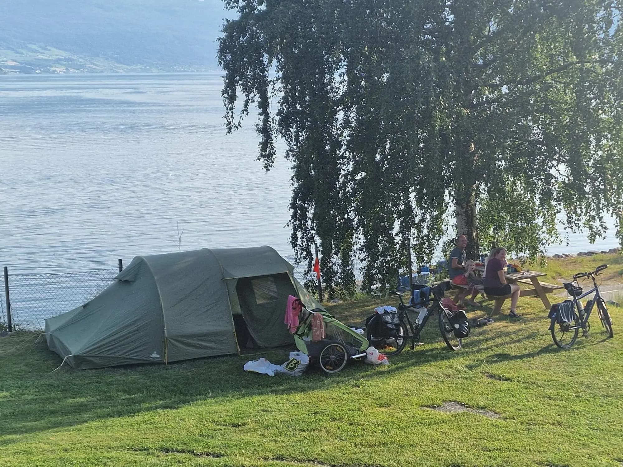 Tent camping by the fjord